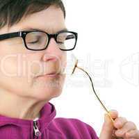 Woman smelling cheese