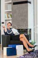 Woman looking clothes gift sale living room