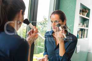 Elegance woman preparation face blush cosmetic brush