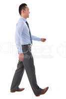 Asian businessman walking