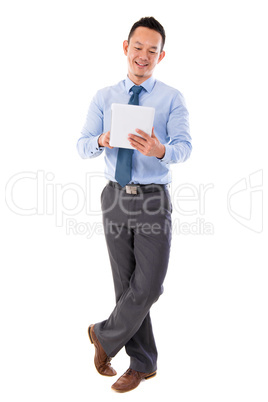 Asian businessman using tablet-pc