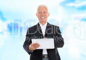 Asian senior businessman using tablet-pc