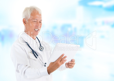 Asian senior doctor using tablet-pc