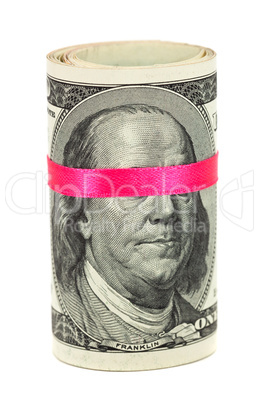 100 US dollar wrapped by ribbon over white background