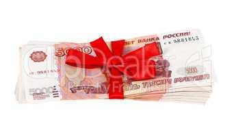 5000 Russian rubles wrapped by ribbon on white background