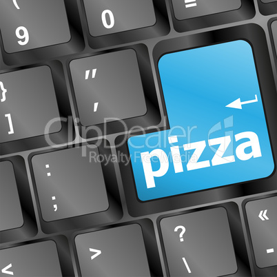 Computer keyboard with blue pizza word on enter key