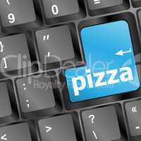 Computer keyboard with blue pizza word on enter key