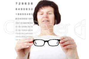 Opticians in fitting eyeglasses