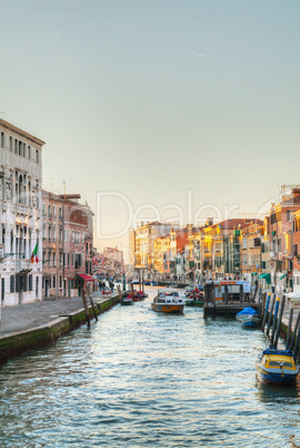 View to a canal from a bridge at sunset