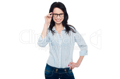Bespectacled young woman in trendy wear