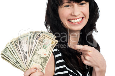 Smiling woman with cash