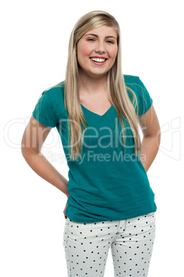 Long haired blonde teen girl in casuals