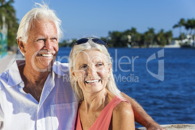 Happy Senior Couple Looking to Tropical Sea or River