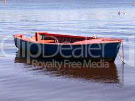 anchored rowing boat