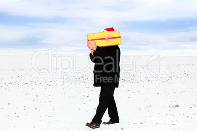 Man running in winter weather with package