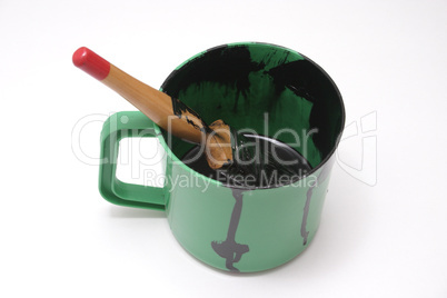 paintbrush in bucket