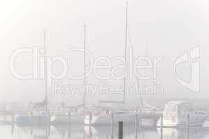 Yachting harbor in haze