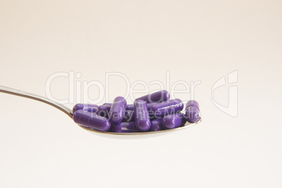 Capsules on a Spoon