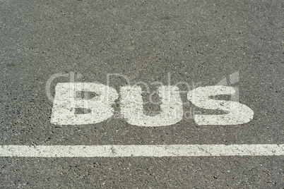 bus word on tarmac