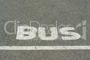 bus word on tarmac