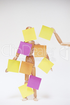 Mannequin with post it sticky note