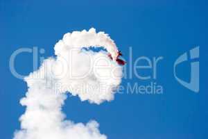 Aircraft at airshow smoke spinning