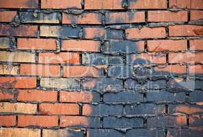 Old red brick wall as background