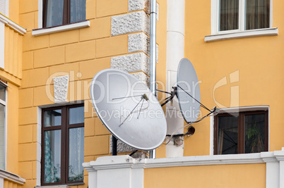 Satellite dishes mounted on the house