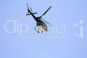 Helicopter patroling Texas beaches