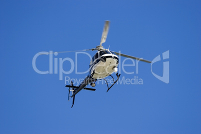 Helicopter in blue sky