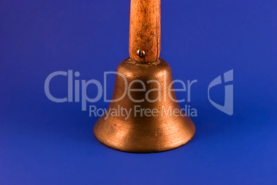 Antique brass school bell closeup