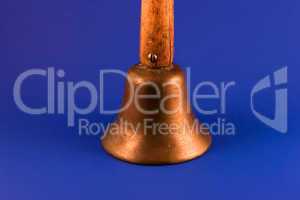 Antique brass school bell closeup
