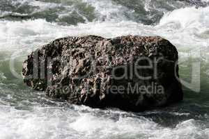 River with jagged rocks.