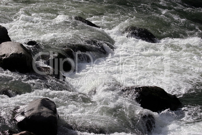 River with jagged rocks.