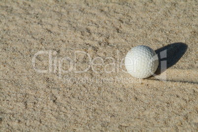 Golf ball in bunker