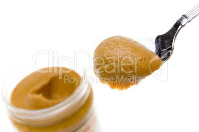 Peanut butter jar and spoon