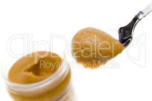 Peanut butter jar and spoon
