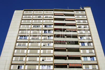 Townhouse with windows and balcony