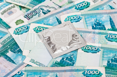Condom on the russian rubles bills