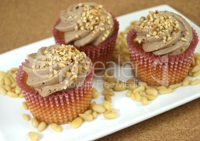 Homemade cupcakes decorated with almonds