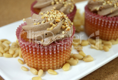 Homemade cupcakes decorated with almonds