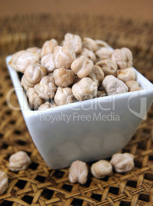 Raw chickpeas in a small bowl