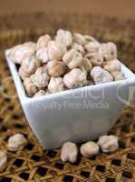 Raw chickpeas in a small bowl