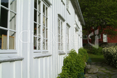 Fasade of old, white wooden house