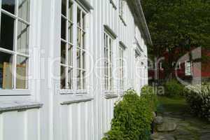 Fasade of old, white wooden house