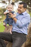 Handsome Hispanic Father and Son Posing for A Portrait