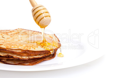 Delicious Freshly Prepared Pancakes with Honey