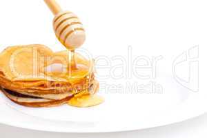 Delicious Freshly Prepared Pancakes with Honey