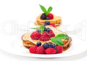 Delicious Freshly Prepared Pancakes with Honey and Berries