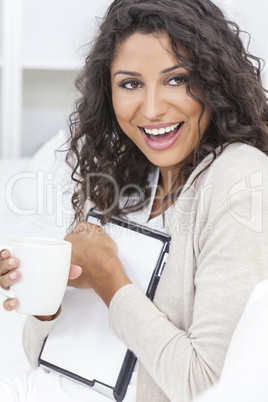 Woman Laughing Tablet Computer Drinking Coffee